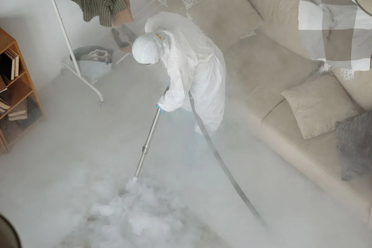 Biohazard cleanup technician in protective equipment, Cut Off, LA